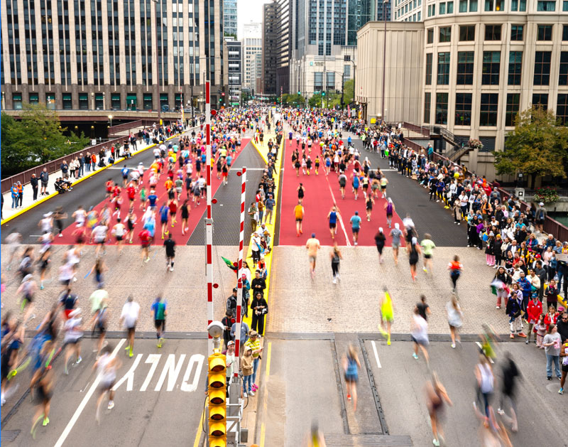 Participants crossing a bridge on course